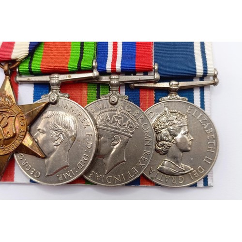 808 - A group of seven medals, awarded to Const David W Austin, comprising a 1939-1945 Star, an Africa Sta... 