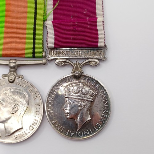 810 - A group of seven medals, awarded to 1862498 Sjt F C Philpot RAOC, comprising a British War Medal, a ... 