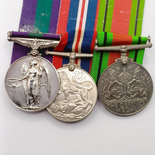 818 - A group of three medals, awarded to 1812486 Sgt R A Quelch RAF, comprising a Defence Medal, a War Me... 