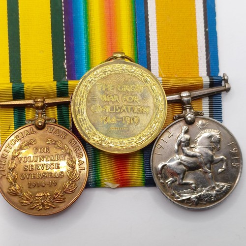 821 - A group of three medals, awarded to 240519 Pte W Knight E Surrey R, comprising a British War Medal a... 