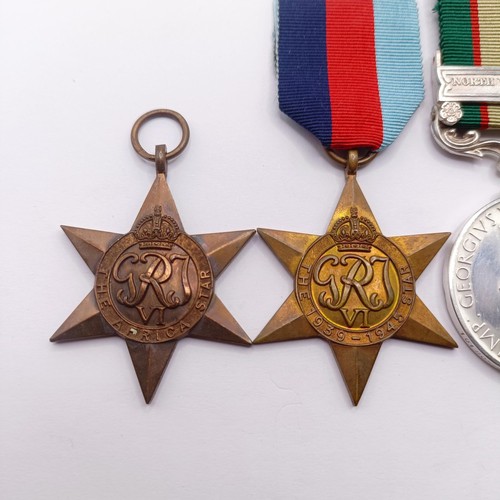 823 - A group of four medals, attributed to 1018052 Sjt S Biggerstaff RA, comprising an India General Serv... 