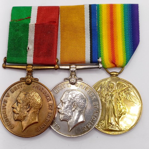 831 - A group of three medals, awarded to 115965 Pte E W Foster RAMC, comprising a British War Medal and V... 