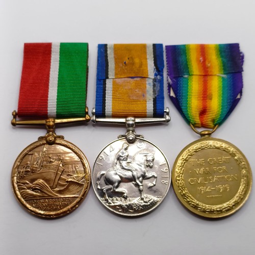 831 - A group of three medals, awarded to 115965 Pte E W Foster RAMC, comprising a British War Medal and V... 