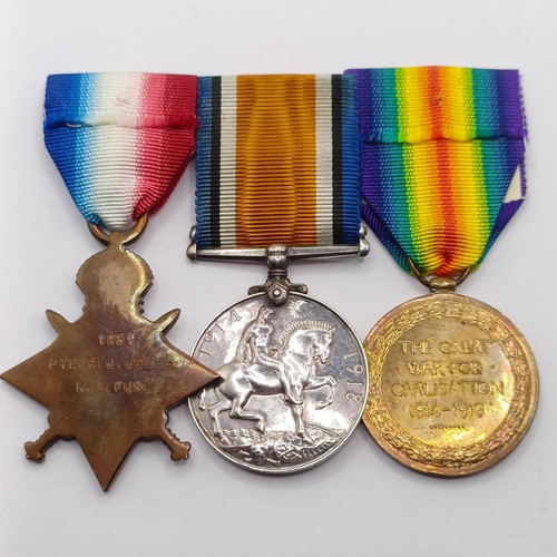 833 - A 1914-15 Star Trio, awarded to 1931 Pte R J Jones R W Fus  Provenance:  From a lifetime of medal co... 