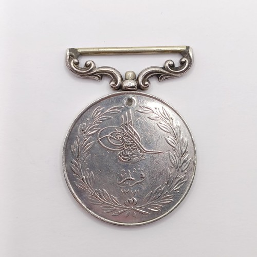 840 - A Turkish Crimea Medal, named to J Hamilton RA  Provenance:  From a lifetime of medal collecting