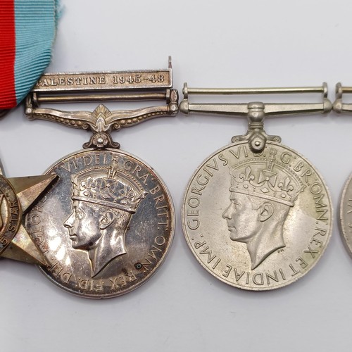 853 - A group of five medals, awarded to 14494315 Rfn A J Jenner KRRC, comprising a 1939-1945 Star, a Fran... 