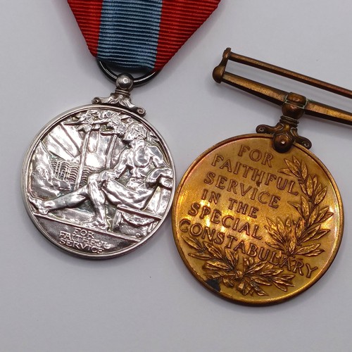 861 - An Imperial Service Medal, awarded to Ernest John Leslie Roberts, a Special Constabulary Medal, awar... 