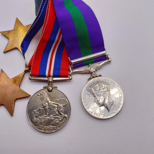 909 - A group of four medals, awarded to 14321729 Gnr R Moss RA, comprising a 1939-1945 Star, a France and... 