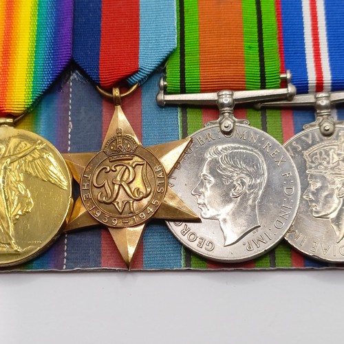 916 - A group of seven medals, awarded to 39212 Gnr H A J Field RA, comprising a British War Medal and Vic... 