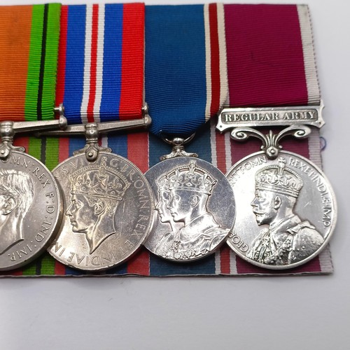 916 - A group of seven medals, awarded to 39212 Gnr H A J Field RA, comprising a British War Medal and Vic... 