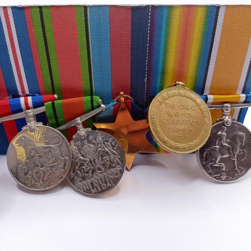 916 - A group of seven medals, awarded to 39212 Gnr H A J Field RA, comprising a British War Medal and Vic... 