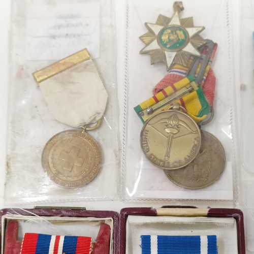 923 - A group of French and other foreign awards  Provenance:  From a lifetime of medal collecting