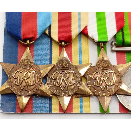 925 - A group of six medals, awarded to 1161601 F Sgt F Bostock RAF, comprising a 1939-1945 Star, an Afric... 