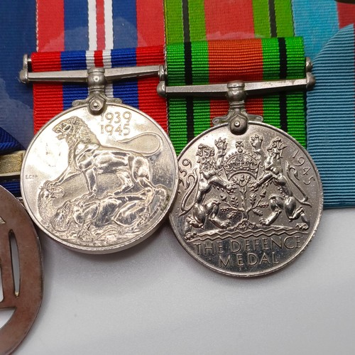 926 - A group of four medals, comprising a 1939-1945 Star, a Defence Medal, a War Medal and an Army Emerge... 