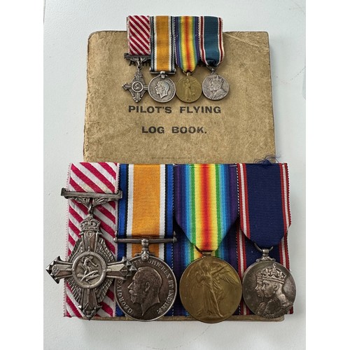 740 - A group of four medals, awarded to 2 Lieut C N C Dickson RAF, comprising an AFC, British War Medal, ... 