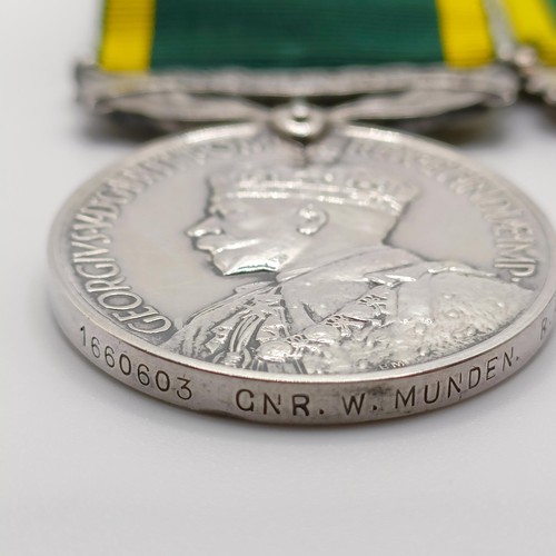 954 - A Territorial Efficiency Medal, awarded to 1660603 Gnr W Munden RA, and another awarded to 1434649 G... 