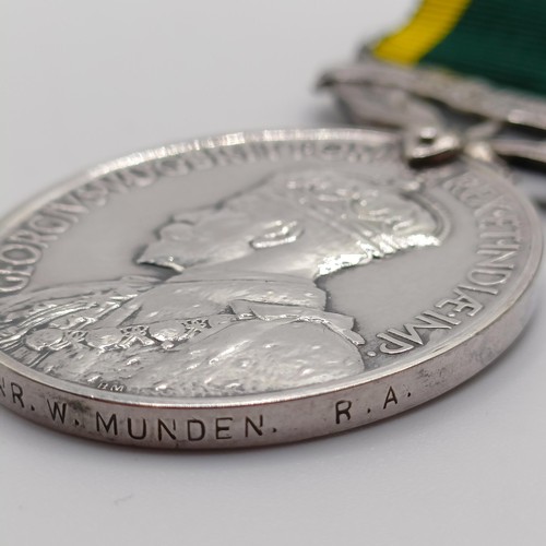 954 - A Territorial Efficiency Medal, awarded to 1660603 Gnr W Munden RA, and another awarded to 1434649 G... 