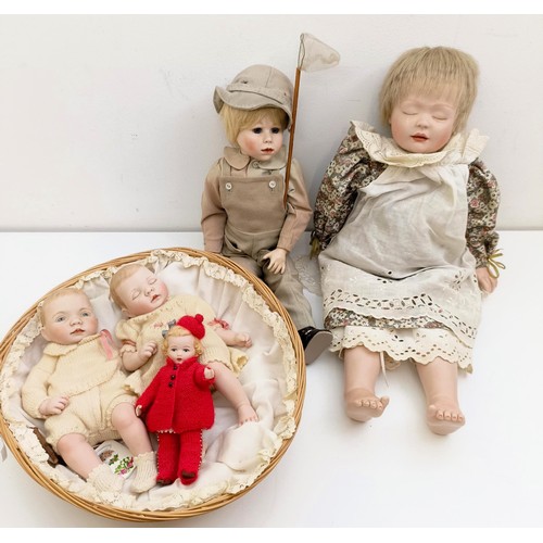 1249 - A bisque head doll, and other dolls (box)