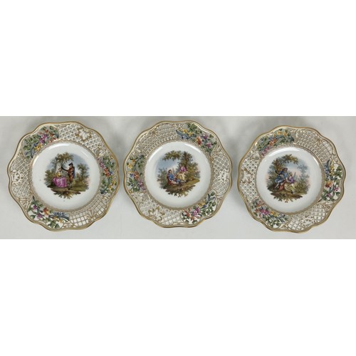 1310 - A Dresden part dessert service, with a pierced border, the centres decorated with figures (qty)