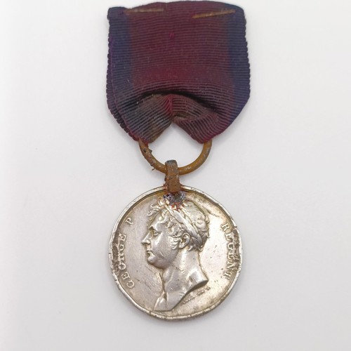 950A - A George III Waterloo Medal, awarded to William Reynolds 51st Reg Light Infantry, with a steel ring ... 