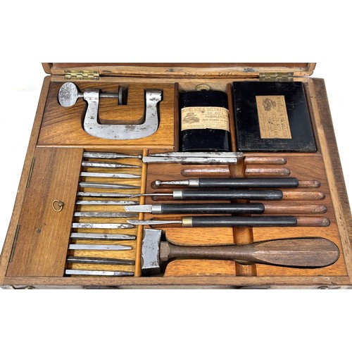 1366 - A French wood carvers type set, in a fitted walnut box, 32.5 cm wide, and an artists paintbox, 35.5 ... 