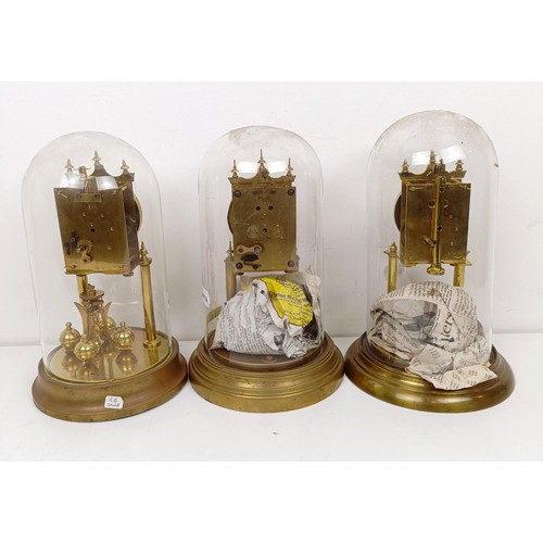 1500 - Three 400 day clocks, under glass domes (3)