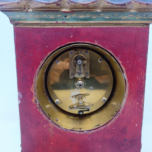 1506 - A mantel clock, with Arabic numerals, in a red case with Chinoiserie style decoration, 26 cm high