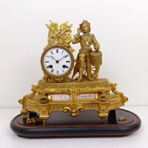 1510 - A gilt metal mantle clock, with enamel dial, in a gilt metal figural case, under a glass dome, 40 cm... 