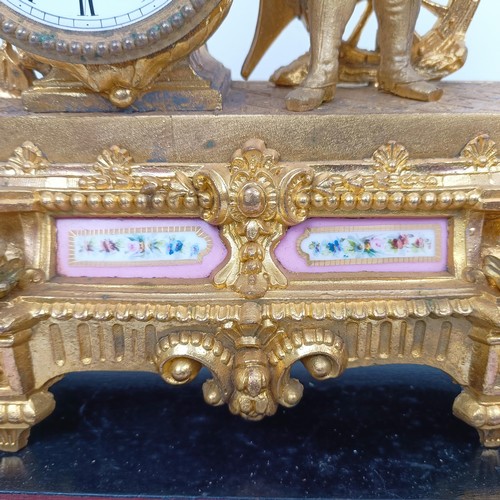 1510 - A gilt metal mantle clock, with enamel dial, in a gilt metal figural case, under a glass dome, 40 cm... 