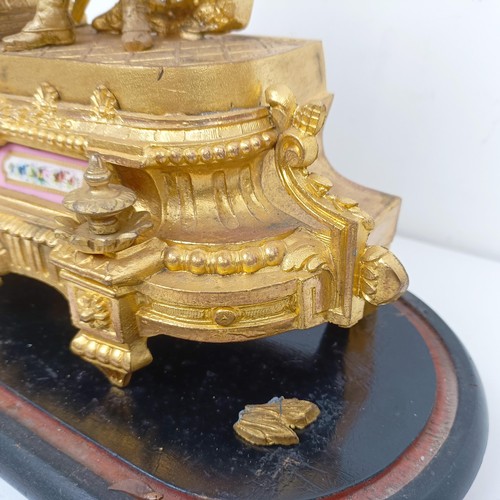 1510 - A gilt metal mantle clock, with enamel dial, in a gilt metal figural case, under a glass dome, 40 cm... 