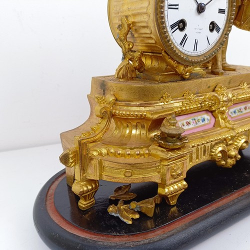 1510 - A gilt metal mantle clock, with enamel dial, in a gilt metal figural case, under a glass dome, 40 cm... 