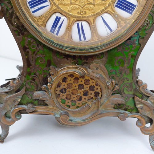 1511 - A Louis XV style mantel clock, the 13.5 cm diameter gilt metal dial with enamel numerals, fitted an ... 