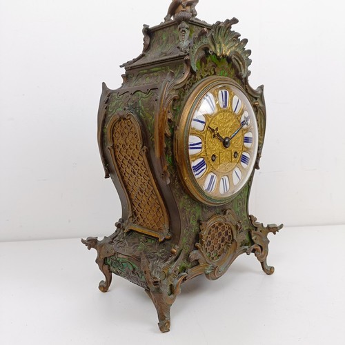 1511 - A Louis XV style mantel clock, the 13.5 cm diameter gilt metal dial with enamel numerals, fitted an ... 