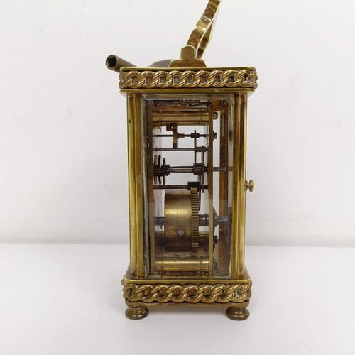 1514 - A carriage clock, retail by Favre Leuba & Co., in a brass case, 15 cm high