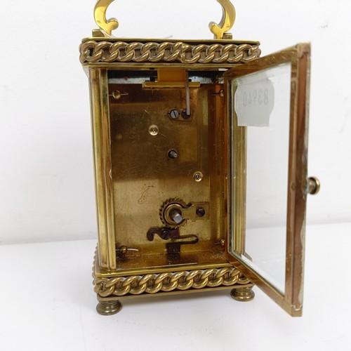 1514 - A carriage clock, retail by Favre Leuba & Co., in a brass case, 15 cm high