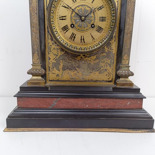 1519 - A mantel clock, the gilt dial having a twin train eight day movement, striking on a chime, in a poli... 