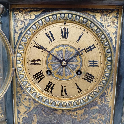 1519 - A mantel clock, the gilt dial having a twin train eight day movement, striking on a chime, in a poli... 