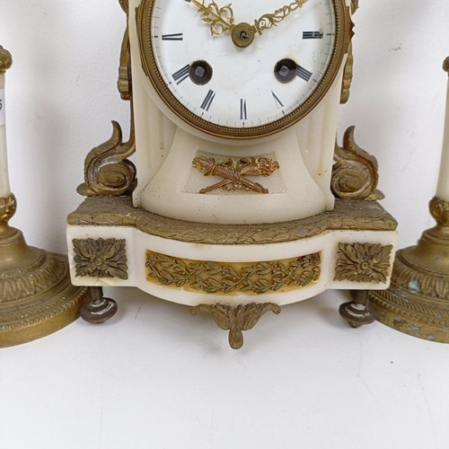 1520 - A late 19th century clock garniture, the clock having a 7 cm diameter enamel dial, with Roman numera... 