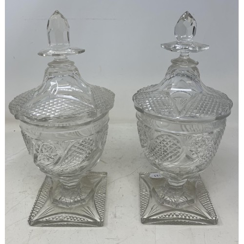 1323 - A pair of 18th century style cut glass vases and covers, 27 cm high