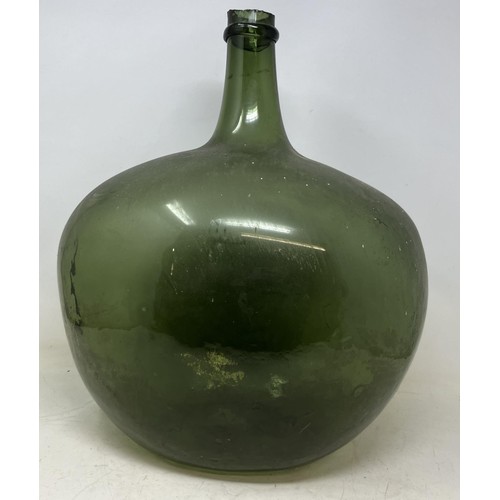 1326 - A stoneware flagon, 43 cm high, a large glass bottle, a suitcase filled with silver plated glass bot... 