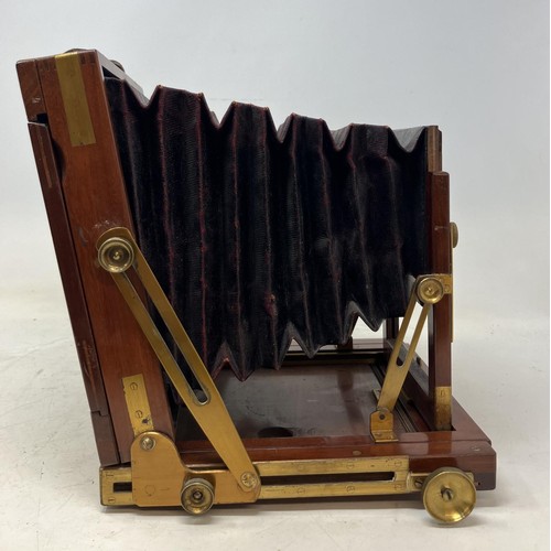 1332 - A Thornton Pickard mahogany plate camera, with assorted plates (qty)