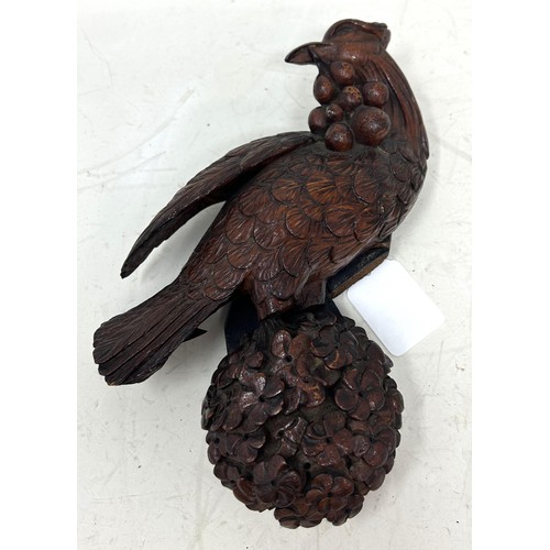 1341 - A pair of late 19th century carved wood figures, of birds, 22 cm high, and 13 cm high (2)