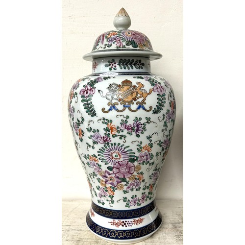 1342 - A Sampson 'Chinese Armorial' garniture of three vases, and covers, 40 cm high (3)