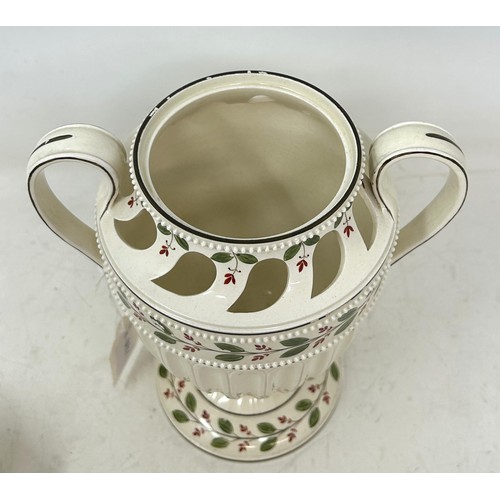 1344 - A Wedgwood creamware pot pourri vase, with twin handles, decorated leaves, 25 cm high