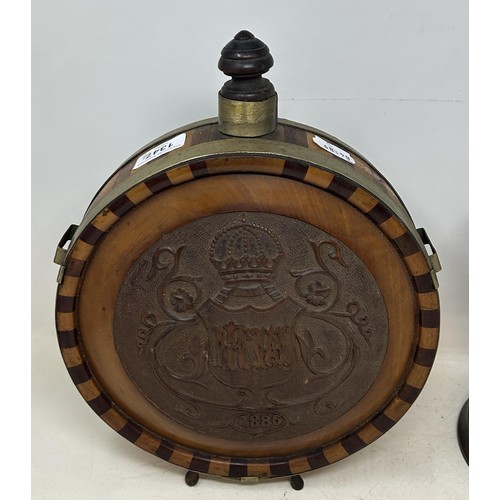 1347 - A late 19th century Dutch treen flask, initialled and dated 1886, 33 cm high, and with a turned wood... 