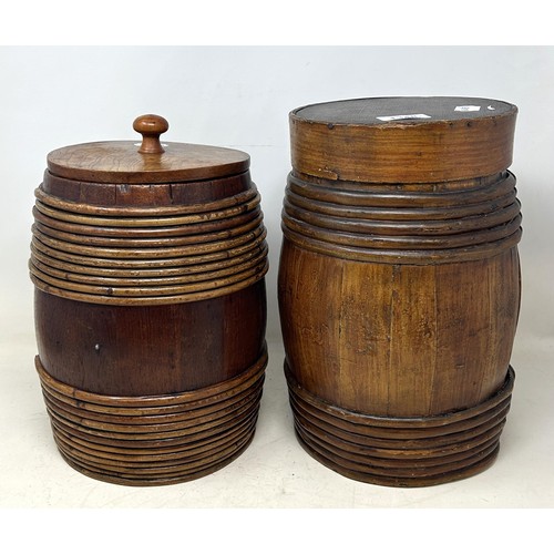 1348 - A late 19th century barrel and cover, 28 cm high, and another similar, 31 cm high (2)