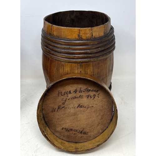 1348 - A late 19th century barrel and cover, 28 cm high, and another similar, 31 cm high (2)