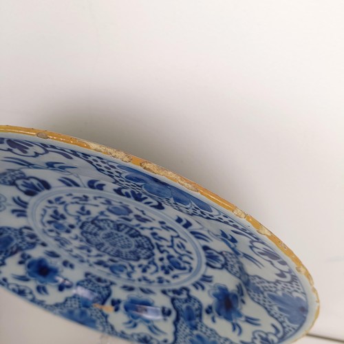 1406 - A Delft blue and white bowl, 31 cm diameter, and assorted other Delft (6)