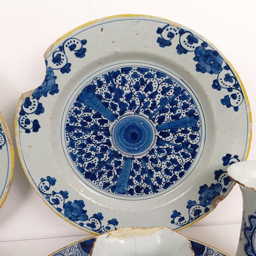 1407 - A pair of blue and white Delft dishes, 36 cm diameter, and assorted other Delft (9)