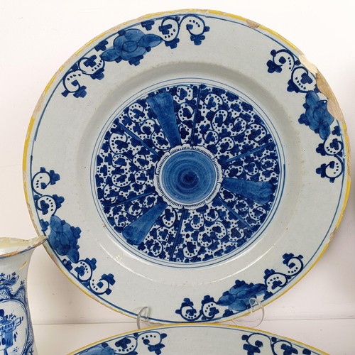 1407 - A pair of blue and white Delft dishes, 36 cm diameter, and assorted other Delft (9)